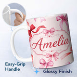 Personalized Custom Name Watercolor Red and Pink Ribbon Bows Neutral Cream Background Cute 11oz Ceramic Coffee Tea Mug White Large Handle