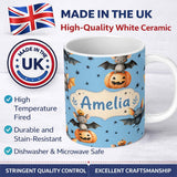 Personalized Custom Name Cute Halloween Bats Sitting on Pumpkins with Stars Blue Background 11oz Ceramic Coffee Tea Mug White Large Handle