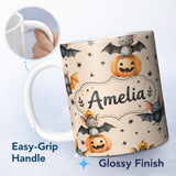 Personalized Custom Name Cute Halloween Bats Sitting on Pumpkins with Stars Beige Background 11oz Ceramic Coffee Tea Mug White Large Handle
