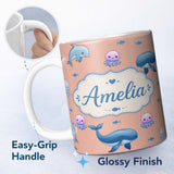 Personalized Custom Name Cute Dolphin Shark and Jellyfish Ocean Animals Peach Background 11oz Ceramic Coffee Tea Mug White Large Handle