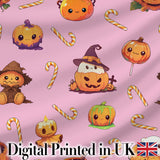 Cute Kawaii Halloween Pumpkin Candy Scarecrow Seamless Pattern Pink Background Digital Print Fabric by the Metre UK Sewing Quilting Textile