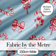 Cute Christmas Candy Cane Ribbon Bow Blue Background Seamless Pattern Digital Print Fabric by the Metre UK Sewing Quilting Textile
