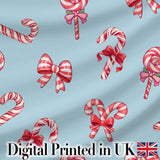 Cute Christmas Candy Cane Ribbon Bow Blue Background Seamless Pattern Digital Print Fabric by the Metre UK Sewing Quilting Textile