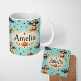 Personalized Custom Name Cute Halloween Bats Sitting on Pumpkins with Stars Teal Background 11oz Ceramic Coffee Tea Mug White Large Handle