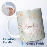 Personalized Custom Name Cute Easter Bunnies with Flowers Carrots Soft Sage Background 11oz Ceramic Coffee Tea Mug White Large Handle